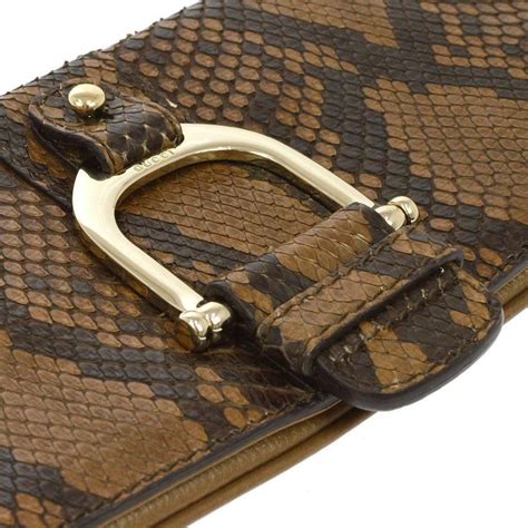 gucci vintage horsebit clutch|Gucci snakeskin clutch.